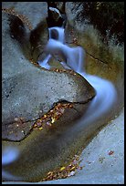 Water flowing over smooth granite, Franconia Notch State Park. New Hampshire, USA (color)