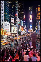 One Times Square at night and Francis Duffy monument. NYC, New York, USA (color)