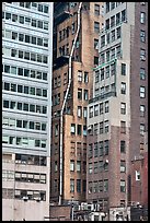 Old high-rise buildings with exterior pipe. NYC, New York, USA ( color)