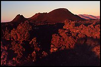 Lava and cinder cones, sunrise, Craters of the Moon National Monument. Idaho, USA (color)