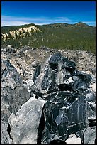 Obsidian and hills. Newberry Volcanic National Monument, Oregon, USA (color)