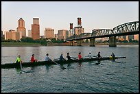 Eight-oar shell on Williamette River and city skyline. Portland, Oregon, USA (color)