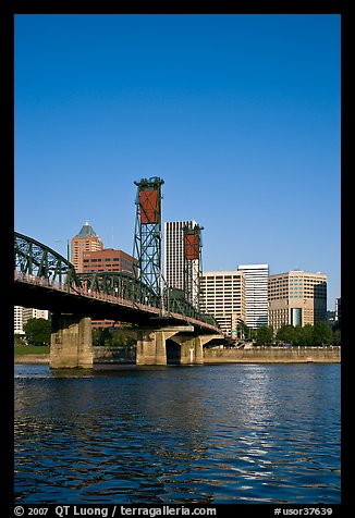 Williamette River at Hawthorne Bridge and high-rise buildings. Portland, Oregon, USA (color)