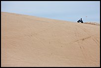 All terrain vehicle on dune crest, Oregon Dunes National Recreation Area. Oregon, USA