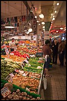 Fruit and vegetable market in Main Arcade, Pike Place Market. Seattle, Washington