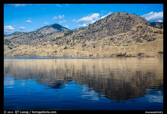 Dry hills reflected in Lake Chelan. Washington (color)