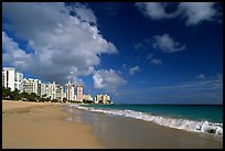 Beach and modern residential towers, morning. San Juan, Puerto Rico (color)