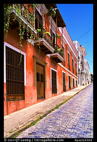 Old cobblestone street and pastel-colored houses, old town. San Juan, Puerto Rico (color)