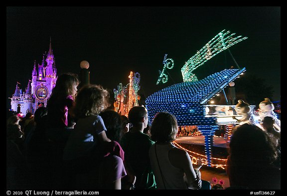 Families watching night parade, Magic Kingdom. Orlando, Florida, USA