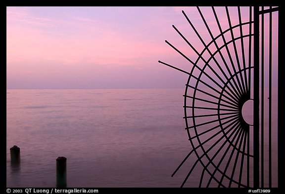 Grid and pilings and sunrise. Key West, Florida, USA