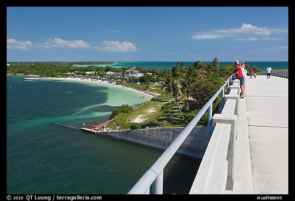 Tourists observing view from old bridge, Bahia Honda Key. The Keys, Florida, USA