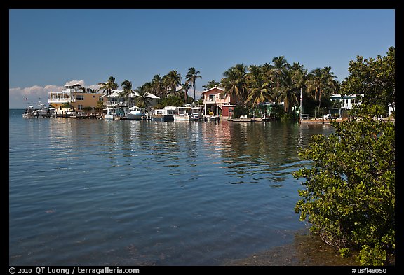 Conch cottages lining edge of Florida Bay, Conch Key. The Keys, Florida, USA