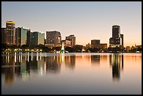 Downtown skyline at sunset, lake Eola. Orlando, Florida, USA