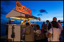 People buying food at stand on Mallory Square. Key West, Florida, USA ( color)