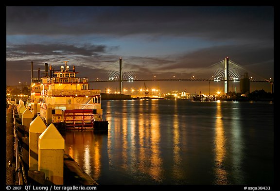 Riverboat and Savannah Bridge at dusk. Savannah, Georgia, USA (color)