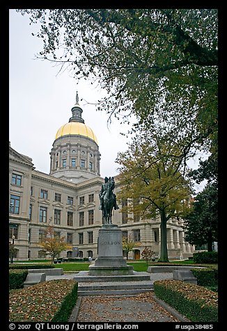 Statue and Georgia Capitol in fall. Atlanta, Georgia, USA