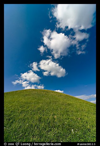 Rounded hill and clouds,  Emerald Mound. Natchez Trace Parkway, Mississippi, USA (color)
