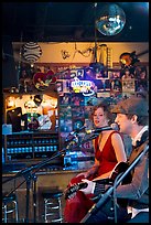Man and woman singing country music at Tootsie Orchid Lounge. Nashville, Tennessee, USA (color)
