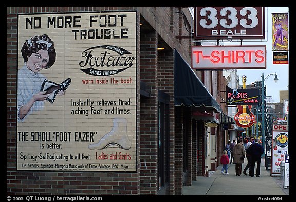Old advertising on brick building and sidewalk, Beale street. Memphis, Tennessee, USA (color)