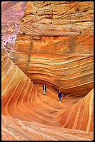 Hikers at the bottom of the Wave. Vermilion Cliffs National Monument, Arizona, USA ( color)