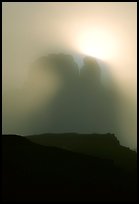 Butte in fog. Monument Valley Tribal Park, Navajo Nation, Arizona and Utah, USA (color)