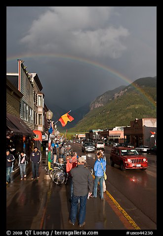 Main street sidewalk and rainbow. Telluride, Colorado, USA