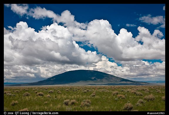 Volcanic hill and clouds. New Mexico, USA