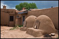 Traditional pueblo ovens. Taos, New Mexico, USA ( color)