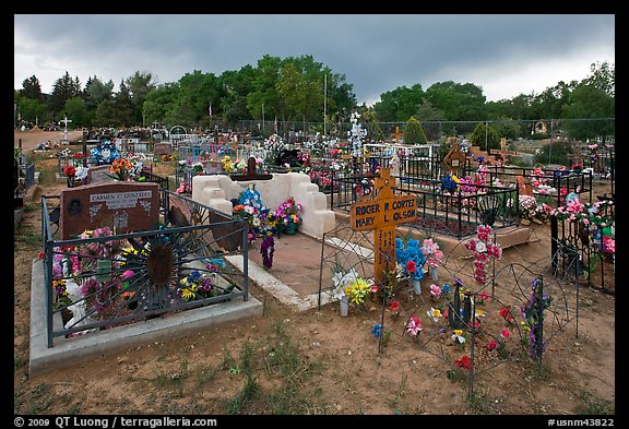 Cemetery with fenced graves. Taos, New Mexico, USA (color)