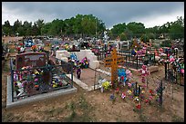 Cemetery with fenced graves. Taos, New Mexico, USA