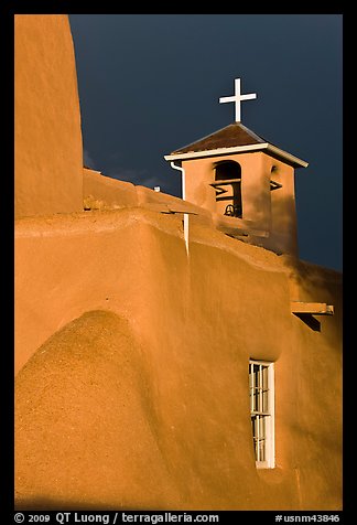 San Francisco de Asisis church under stormy sky. Taos, New Mexico, USA