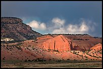Red cliffs and dark sky. New Mexico, USA