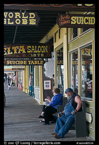 Arcade with suicide table sign. Virginia City, Nevada, USA (color)