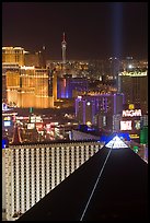 Luxor pyramid, casinos, and Stratosphere tower at night. Las Vegas, Nevada, USA