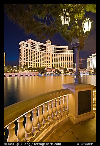 Lamp, reflection lake, and Bellagio hotel at night. Las Vegas, Nevada, USA