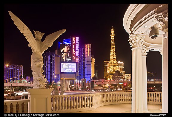 Gazebo and statue of Caesar Palace frames Ballys and Paris Hotel. Las Vegas, Nevada, USA (color)