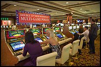 Gambling with gaming  machines. Las Vegas, Nevada, USA ( color)