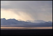 Distant mountains with storm brewing. Basin And Range National Monument, Nevada, USA ( color)