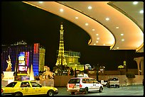 Taxis at hotel entrance, Paris Las Vegas. Las Vegas, Nevada, USA (color)