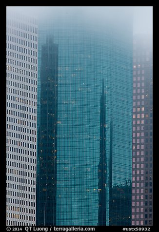 Top of skyscrapers capped by fog. Houston, Texas, USA (color)