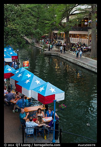 Restaurant tables under Texas flag umbrellas. San Antonio, Texas, USA (color)