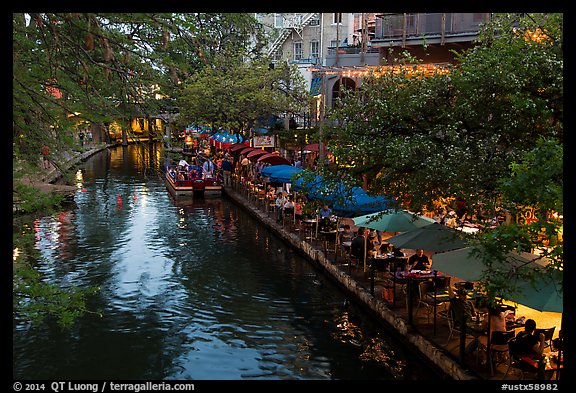 Restaurant tables and barge, Riverwalk. San Antonio, Texas, USA (color)