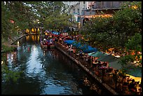 Restaurant tables and barge, Riverwalk. San Antonio, Texas, USA ( color)