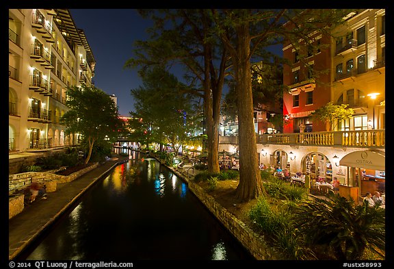 Residences and restaurants, Riverwalk at night. San Antonio, Texas, USA (color)