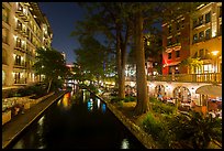 Residences and restaurants, Riverwalk at night. San Antonio, Texas, USA ( color)