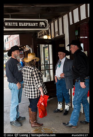 Group in front of White Elephant bar. Fort Worth, Texas, USA (color)