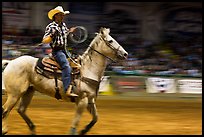 Rodeo contestant riding horse. Fort Worth, Texas, USA ( color)