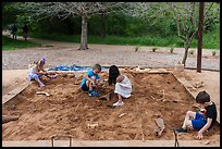 Children play in dig playground. Waco Mammoth National Monument, Texas, USA ( color)