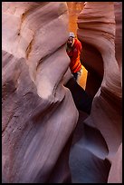 Man inside Peek-a-Boo slot canyon. Grand Staircase Escalante National Monument, Utah, USA ( color)