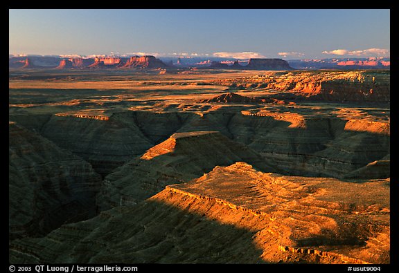 San Juan drainage from Muley Point, with Monument Valley in the background, morning. Utah, USA (color)